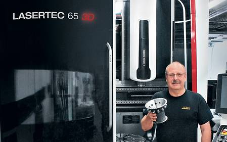 Marv Fiebig, president of PTooling, in front of his new LASERTEC 65 3D
